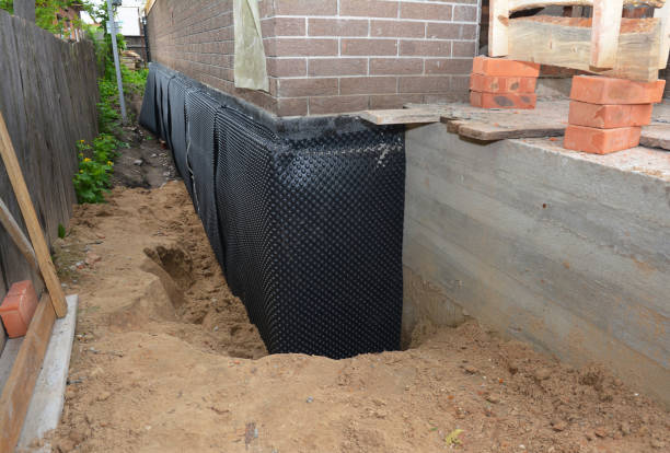 SJ Waterproofing Pros technician performing targeted Waterproofing assessment in Williston, OH